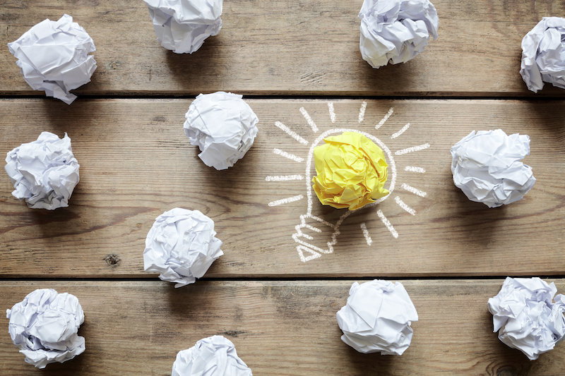 Good idea crumpled paper light bulb metaphor